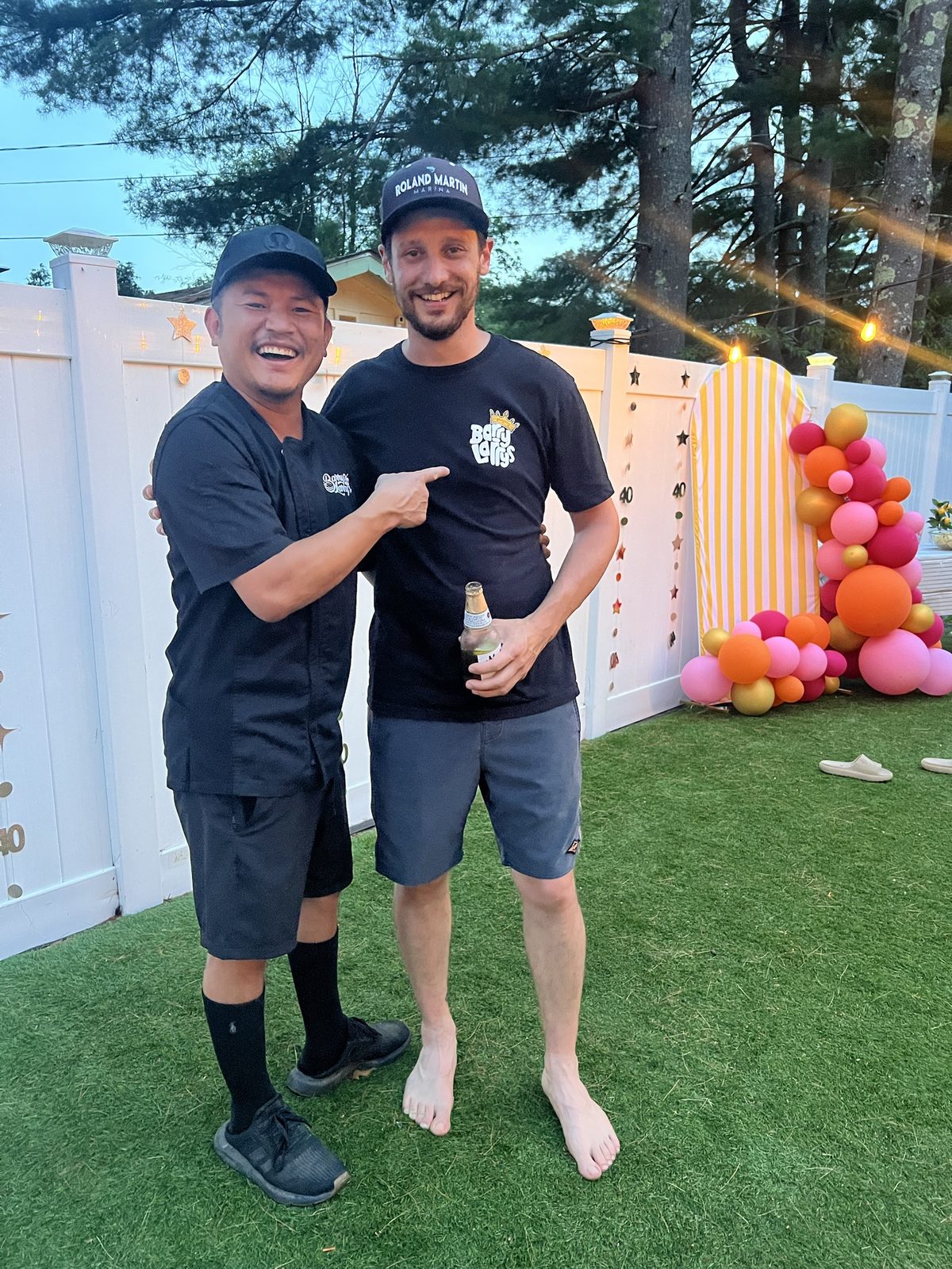 Barry Larry celebrating with a happy customer at a birthday party