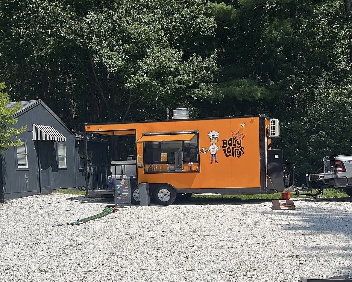 Barry Larry's food truck parked at a daytime private event